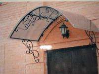 Облегченный кованый козырек